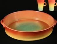 Functional stoneware - mugs & oven-to-table dishes in warm colours © The Robert James Studio